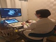 복부 초음파 검사를 하는 환자